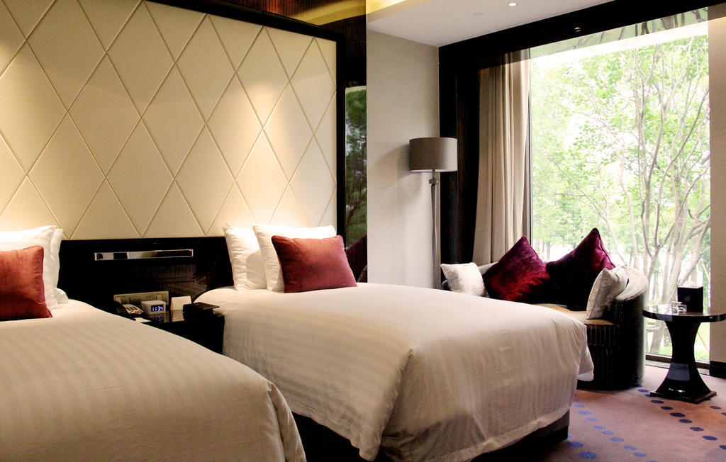 New Century Grand Hotel Nanxun Huzhou Chambre photo