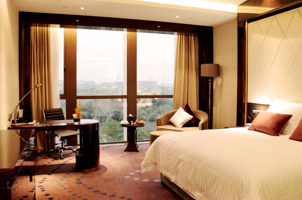 New Century Grand Hotel Nanxun Huzhou Chambre photo